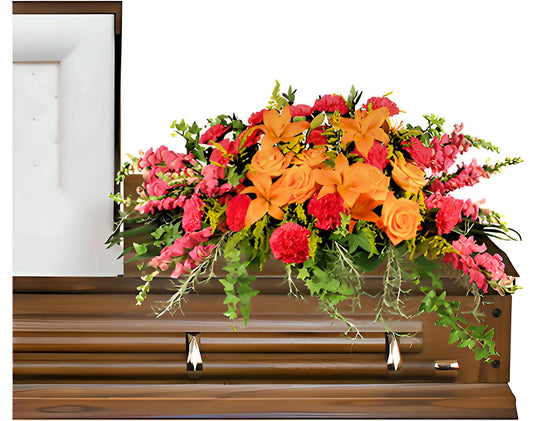 TRIUMPHANT TRIBUTE CASKET SPRAY